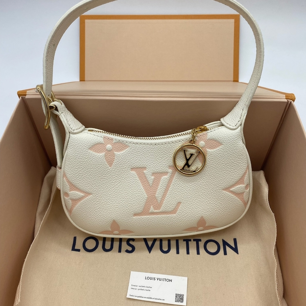 SOLD!!!Louis Vuitton Mini Moon Bicolor Monogram Empreinte Leather